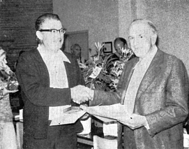 Everett E. Farwell, Jr., left, and Frank Pagliettini congratulate each other 
after receiving ARS Bronze Medals.