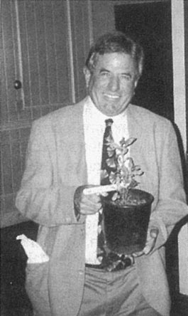 Peter del Tredici of the Arnold
Arboretum in Massachusetts receives the plant of the Fraseri Group. The plant was presented
to him by Dick Brooks of the Massachusetts Chapter.