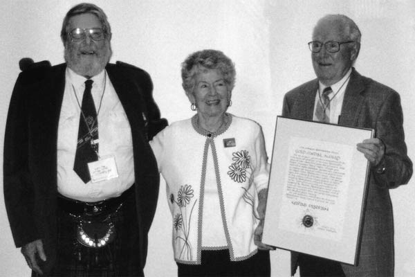 Clive Justice, Jean Smith, and Britt Smith
accept award for Keshab Pradhan