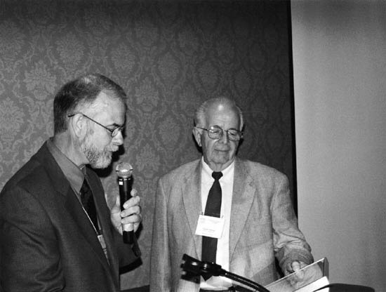 ARS President Mike Stewart, left,
presents the award for Harry Wise to Frank Pelurie, Alternate District 9 Director