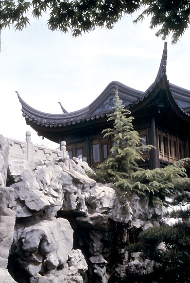 Upturned roof and elaborately eroded stone
from Lake Tai Hu.