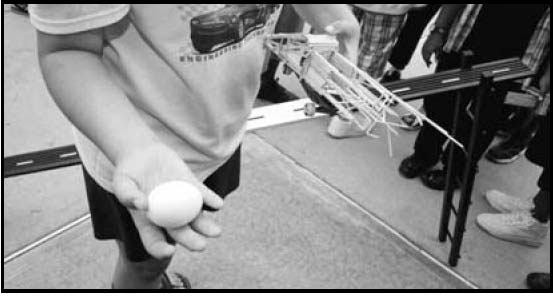 A photo of the a successful resultof a safety structure crash test: : an undamaged egg. (IUPUI Media Gallery)