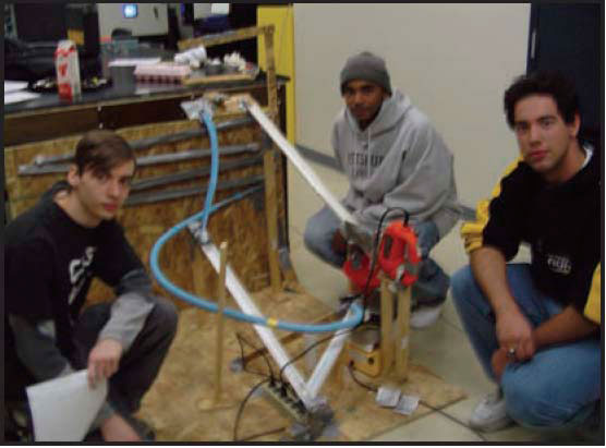 Photos showing a Rube Goldberg project with conventional means used for frying eggs.